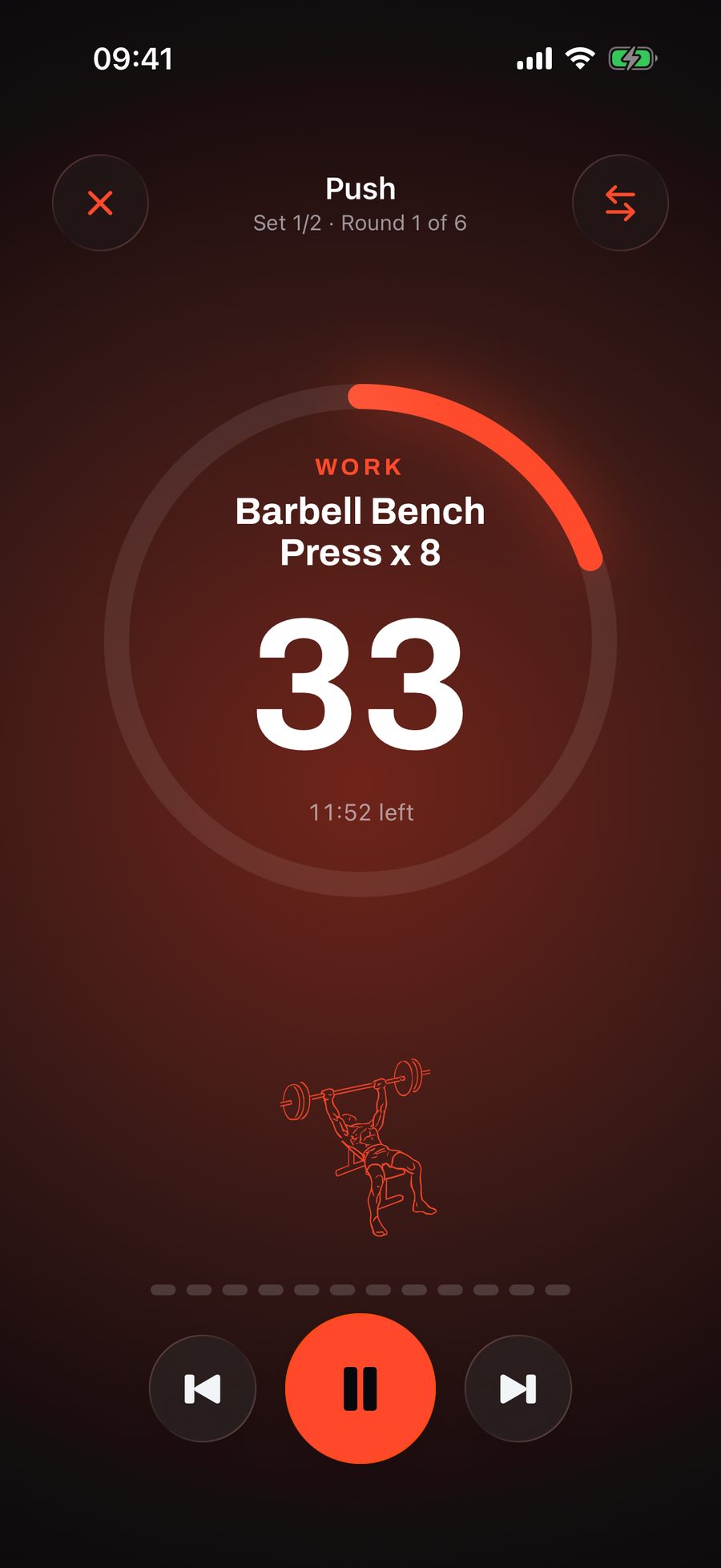 Rounds counting down thirty-three seconds of work on barbell bench press for eight, the ring in orange, with eleven fifty-two left in the session.